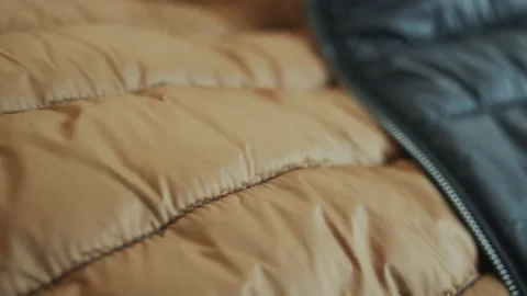Modern jacket zipper and both faces 4K video Stock Footage 170111845