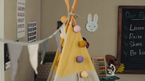 Modern Kindergarten Classroom Interior with Educational Blackboard and Teepee Stock Footage 332323669