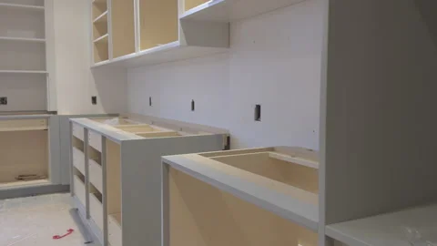 Modern Kitchen Cabinets Installation in Progress, Gray Cabinetry Stock Footage 335184555