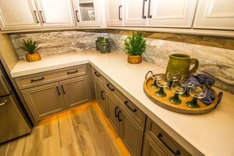 Modern Kitchen Counter with Decorator Items And Serving Tray Stock Photos