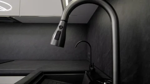 Modern kitchen design featuring sleek surfaces and elegant fixtures for stylish Stock Footage 310086669