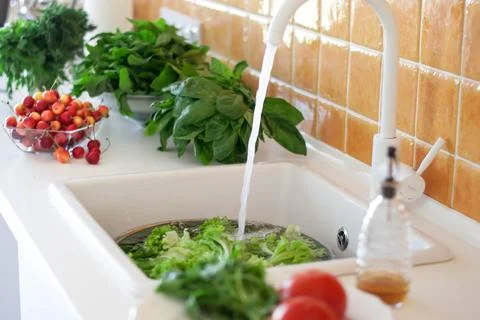 Modern kitchen with herbs Stock Photos