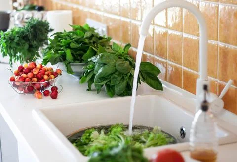 Modern kitchen with herbs Stock Photos