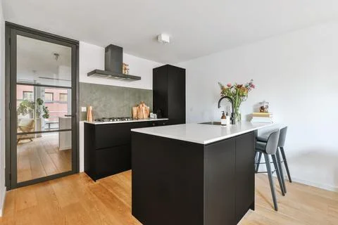 Modern kitchen interior in apartment Stock Photos