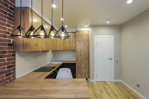 Modern kitchen interior in an apartment Stock Photos
