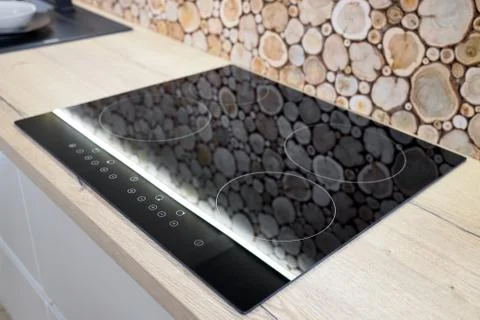 Modern kitchen interior with black induction stove, cooker, hob or built in c Stock Photos
