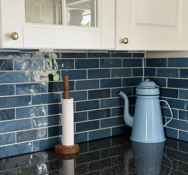 Modern kitchen interior with blue ceramic tile backsplash Stock-Fotos