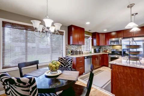 Modern kitchen interior with dining area Stock Photos