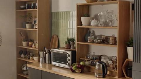 Modern Kitchen Interior Featuring Wooden Shelves and Appliances Stock Footage 338055096