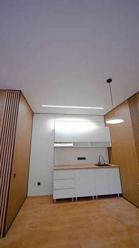 Modern Kitchen Interior with Smooth Stretch Ceiling and Pendant Light Stock Footage 345981257