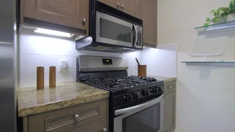 Modern Kitchen Makeover: Appliance Upgrade Stock Footage 266061872