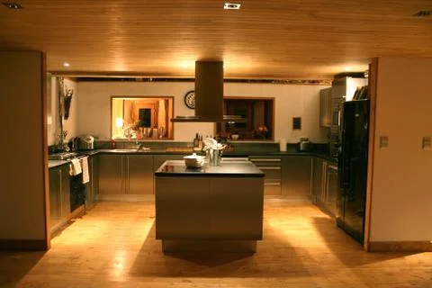 Modern kitchen at night Stock Photos