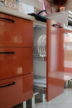 Modern kitchen with open plate drying door Stock Photos