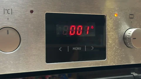 Modern Kitchen Oven Operates with a Consistent Low Fan Hum Stock Footage 329455715
