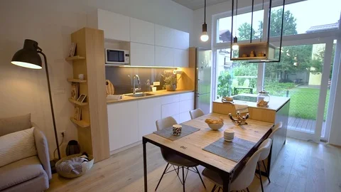 Modern kitchen overlooking the garden   Stock Footage 111016899