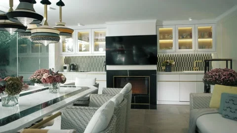 Modern kitchen with panoramic windows and a beautiful view of the courtyard Stock Footage 165987856