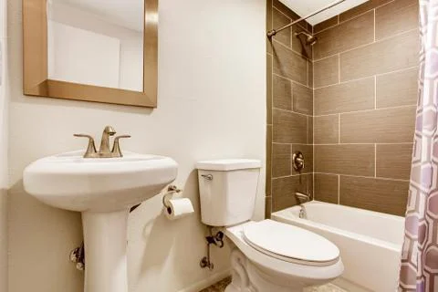 Modern kitchen room interior with tile wall shower, toilet and washbasin stan Stock Photos