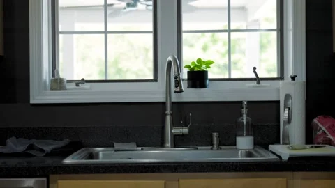 Modern Kitchen Sink in Natural Sunlight – Bright Home Interior Footage Stock Footage 342315572