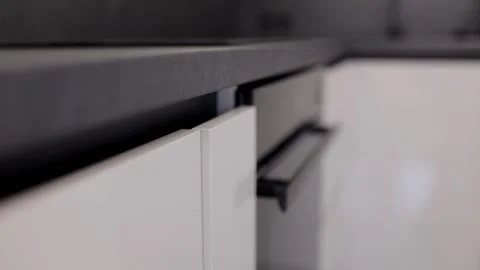 Modern kitchen storage solutions in a sleek, contemporary design featuring Stock Footage 310086585