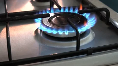 Modern kitchen stove cook with blue flames, cooking gas Stock Footage 204040987
