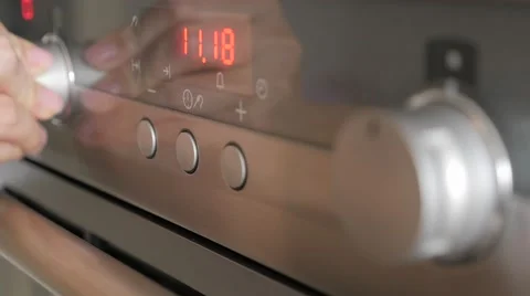 Modern kitchen stove selective focus push buttons  while programing for cooki Video stock 50212229