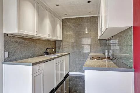 Modern kitchen with tile trim Stock Photos