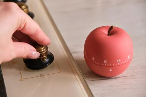 Modern kitchen timer apple shaped on the kitchen Stock Photos