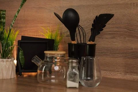 Modern Kitchen Tools And Decor. Sleek Glass And Wooden Kitchenware For Tidy Stock Photos