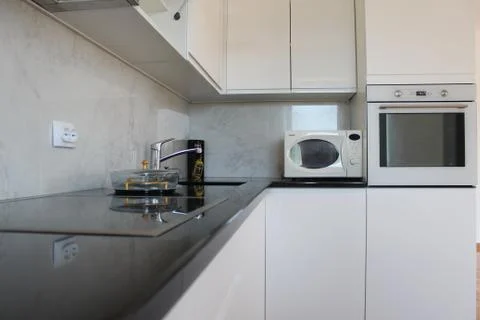 Modern kitchen in white Stock Photos