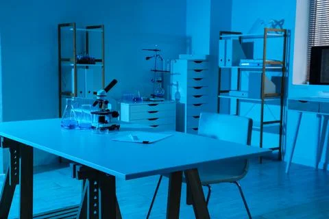 Modern laboratory interior with microscope beakers and scientific equipment o Stock Photos