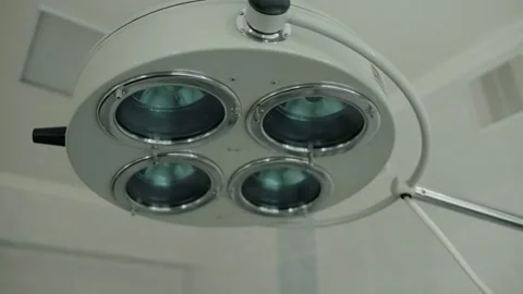 Modern lamp in operating room surgical department in hospital for performing Stock Footage 317088769
