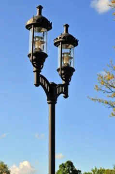 Modern lantern in the park Stock Photos