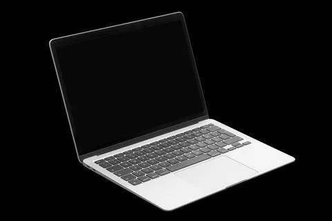 A modern laptop computer on black background 写真素材