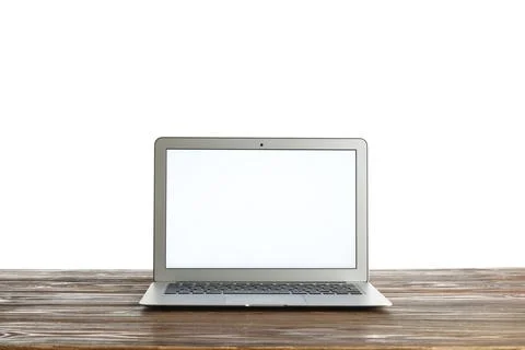 Modern laptop computer with blank white screen on rustic wooden table, digita Stock Photos