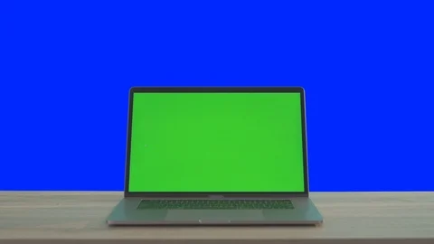 Modern laptop computer with open mock-up monitor greenscreen technology on Stock Footage 117430082