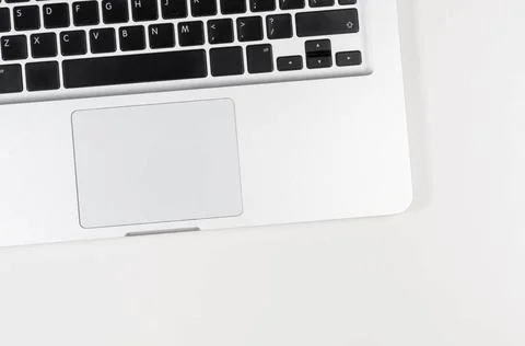 Modern laptop computer, top view Modern laptop computer on white table, vi... Stock Photos