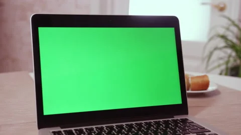 Modern laptop with green chromakey screen ready for use Stock Footage 228780247