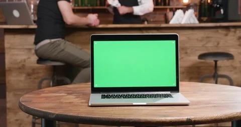 Modern laptop with green screen on Stockbeeldmateriaal 104493255