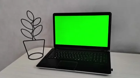 Modern laptop on table, on gray wall background Stock Footage 155847807