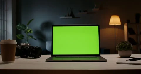 Modern laptop with template copy space green screen set on table in living room Stock-Footage 137044073