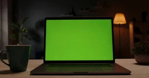 Modern laptop with template copy space green screen set on table in living room 動画素材 138471237