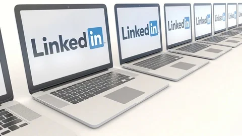 Modern laptops with LinkedIn logo. Computer technology conceptual editorial 4K Stock Footage 73069956
