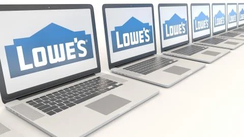 Modern laptops with Lowe's logo. Computer technology conceptual editorial 3D Illustrazione stock