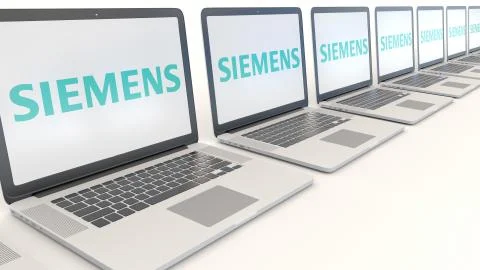 Modern laptops with Siemens logo. Computer technology conceptual editorial 3D Illustrazione stock