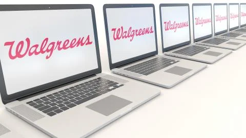 Modern laptops with Walgreens logo. Computer technology conceptual editorial 3D 스톡 일러스트
