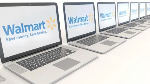 Modern laptops with Walmart logo. Computer technology conceptual editorial 3D 스톡 일러스트