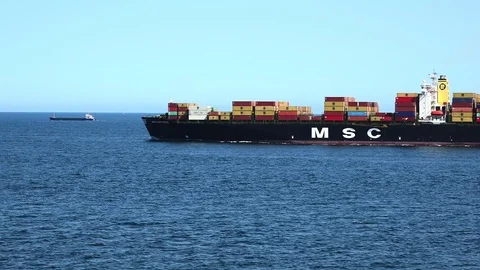 Modern large freight vessel with coloured metal containers Stock Footage 113458828