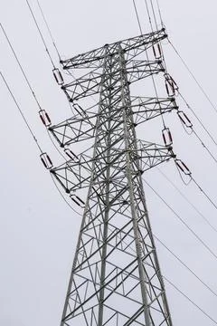 Modern large high voltage electric tower closeup Foto stock