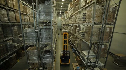 Modern large warehouse and loader Stock Footage 60124850