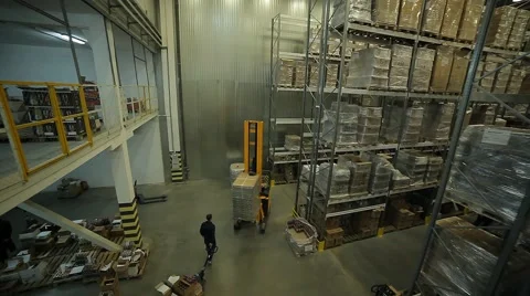 Modern large warehouse and loader Stock Footage 60125794